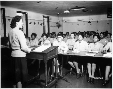 U.S. Army nurses are taking notes during a lecture in (a) classroom at the Army Nurse Training Center in England., 09- - NARA - 531411