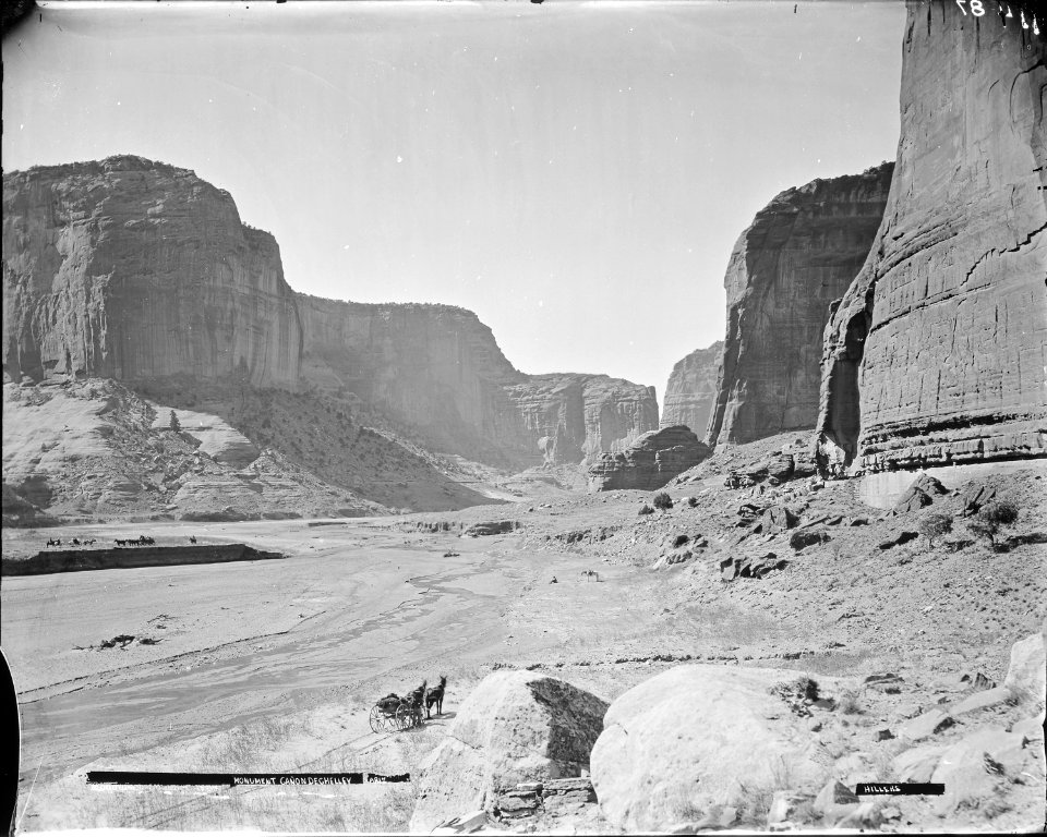 (Old No. 114) Monument Canyon De Chelly, Arizona. Hillers photo. A man is standing beside a - NARA - 517761
