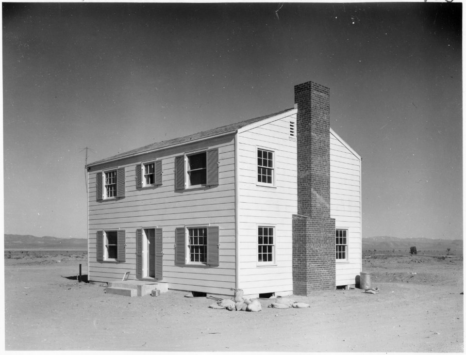 (Operation Cue) - Two-story wood frame house at 5,500 feet (from blast site) - NARA - 541785