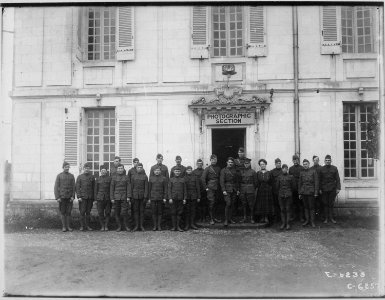 14th Photo Section, 1st Army, The Balloonatic Section. Captain A. W. Stevens (center, front row) and personnel. Air... - NARA - 512861