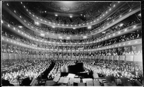 A full house, seen from the rear of the stage, at the Metropolitan Opera House for a concert by pianist Josef Hofmann, 1 - NARA - 541890 photo