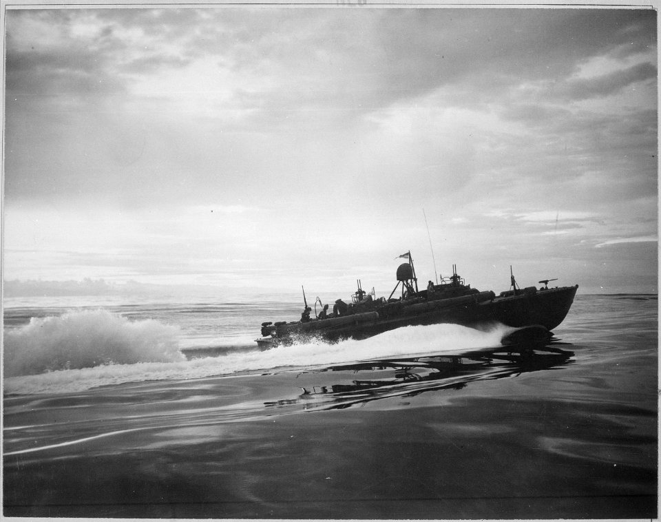 A motor torpedo boat patrolling off coast of New Guinea. - NARA - 520620