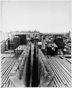 Airshaft of a dumbbell tenement, New York City, taken from the roof, ca. 1900 - NARA - 535468 photo