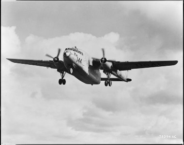 A giant transport of the U.S. Far East Air Forces Combat Cargo Command roars in for a landing at an advanced airfield... - NARA - 542223 photo