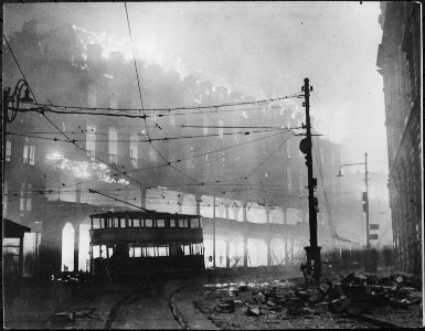 A burning building in Sheffield which was raided recently. New York Times Paris Bureau Collection. - NARA - 541901
