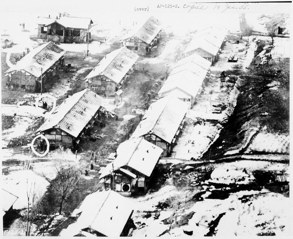 Aerial photos made from low-flying unarmed U.S. Air Force jet reconnaissance planes revealed these barracks-type... - NARA - 542282