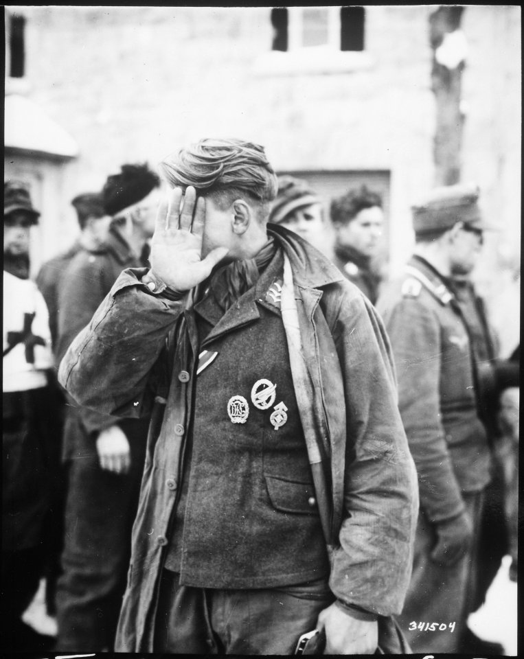A German prisoner captured by the 16th Infantry Regiment, near Weywertz. Belgium. - NARA - 531359