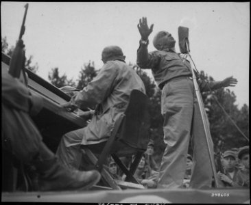 Al Jolson entertains U.S. troops at Pusan Stadium during his visit to the fighting front. He died shortly after his... - NARA - 531375