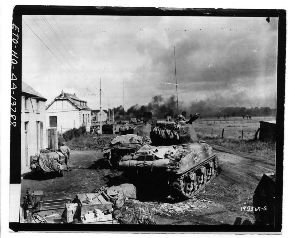 American Armor Fans Out Near Gelin, Belgium to Blast at Trapped German Infantry - NARA - 6003971
