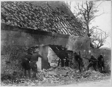 American snipers of the 166th Infantry (formerly 4th Infantry, Ohio National Guard), in nest picking off Germans on... - NARA - 530738 photo