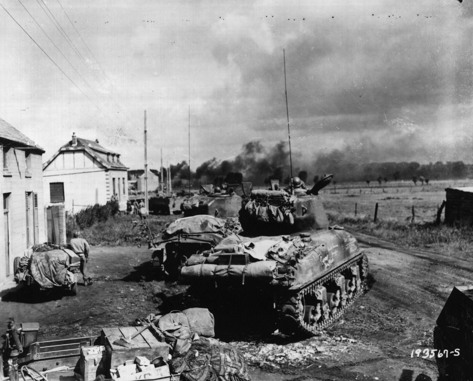 American Armor Fans Out Near Gelin, Belgium to Blast at Trapped German Infantry - NARA - 6003971 - cropped