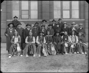 Arapaho, Cheyenne, and Chippewa delegation. Photographed in front of the Smithsonian's Arts and Industries Building. - NARA - 523612