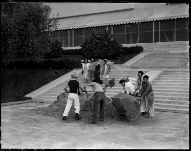 Arcadia, California. Cleaning up the grounds at the Santa Anita Assembly center, formerly a race tr . . . - NARA - 537399