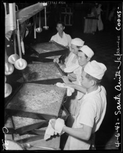 Arcadia, California. Cooks of Japanese ancestry prepare meals for thousands of evacuees at the Sant . . . - NARA - 537411