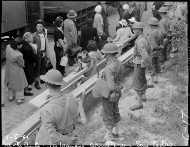Arcadia, California. Evacuees of Japanese ancestry arriving at the Santa Anita Assembly center from . . . - NARA - 537398