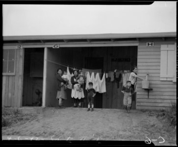 Arcadia, California. Evacuee mothers, with their children, getting acquainted at the Santa Anita Assembly . . . - NARA - 537387