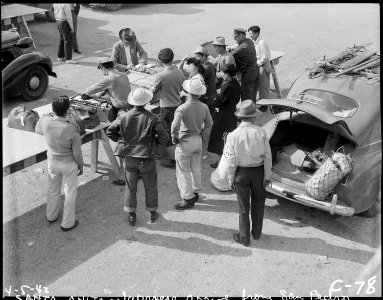 Arcadia, California. Evacuees of Japanese ancestry arrive at Santa Anita Assembly center from San Pedro. - NARA - 537450