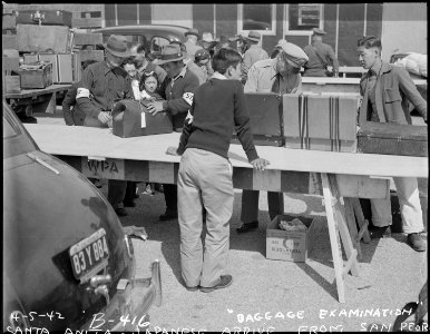 Arcadia, California. All baggage is inspected before newcomers enter Santa Anita Assembly center fo . . . - NARA - 537042