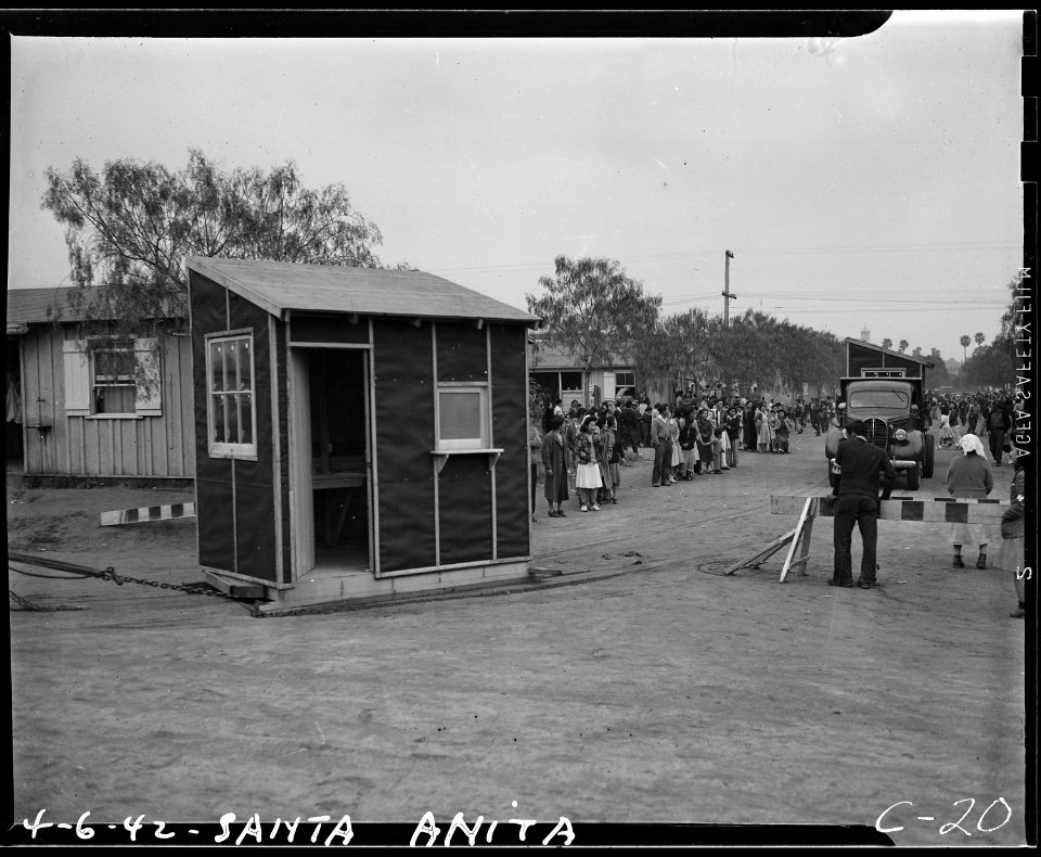 Arcadia, California. Evacuees watching transformation of Santa Anita race track into assembly cente . . . - NARA - 537401