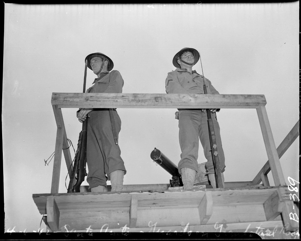 Arcadia, California. Military police on duty in watch-tower at the Santa Anita assembly center for . . . - NARA - 537020