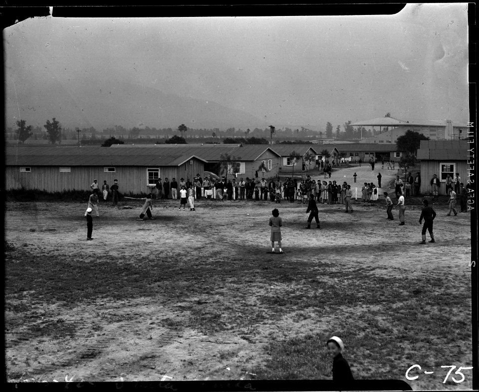 Arcadia, California. An impromptu baseball game is held by young evacuees of Japanese ancestry at S . . . - NARA - 537447
