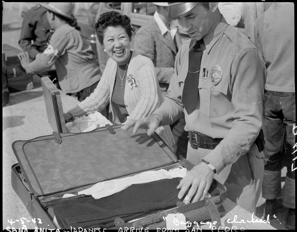 Arcadia, California. All baggage is inspected before newcomers enter Santa Anita assembly center fo . . . - NARA - 537043