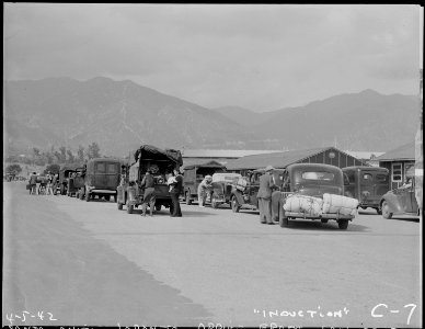 Arcadia, California. Evacuees of Japanese ancestry arriving at this assembly center from San Pedro. . . . - NARA - 537388