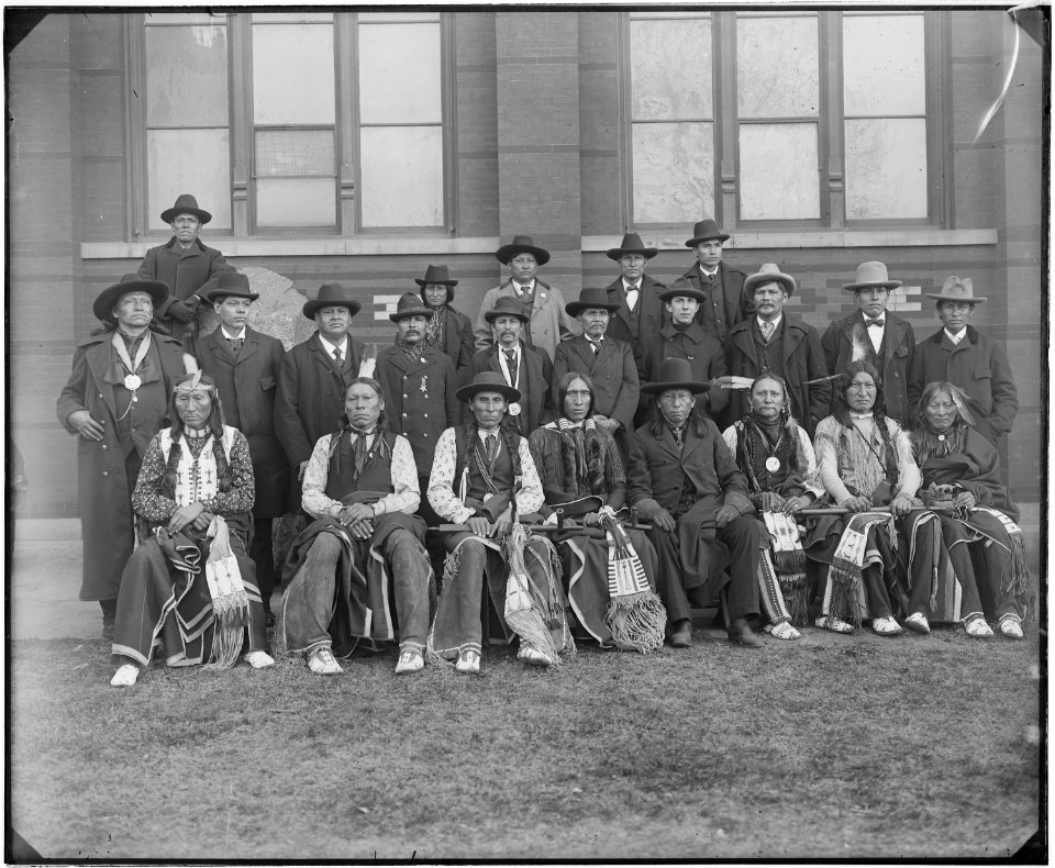 Arapaho, Cheyenne, and Chippewa delegation. Photographed in front of the Smithsonian's Arts and Industries Building. - NARA - 523613