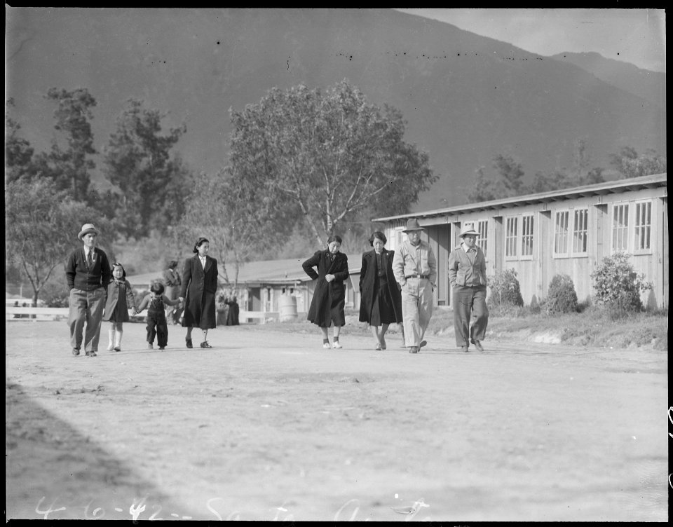 Arcadia, California. Evacuees of Japanese ancestry out for a stroll at the Santa Anita Assembly center. - NARA - 537400