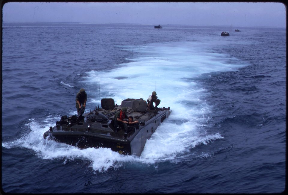 Amtracs coming into the LPD during training exercises involving the 1st Amphibious Tractor Battalion. - NARA - 532457