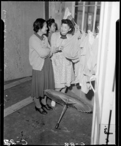 Arcadia, California. Mrs. Lily Okura taking in the wash and making new friends at the Santa Anita A . . . - NARA - 537402