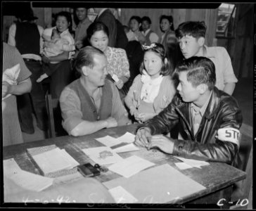 Arcadia, California. New arrivals at the Santa Anita Assembly center are assigned quarters in the b . . . - NARA - 537391