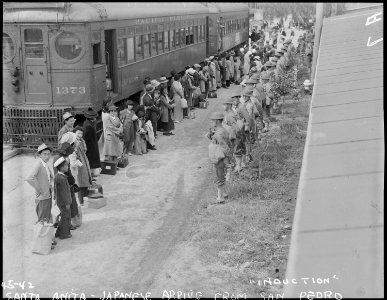 Arcadia, California. Persons of Japanese ancestry arrive at the Santa Anita Assembly center from Sa . . . - NARA - 536004