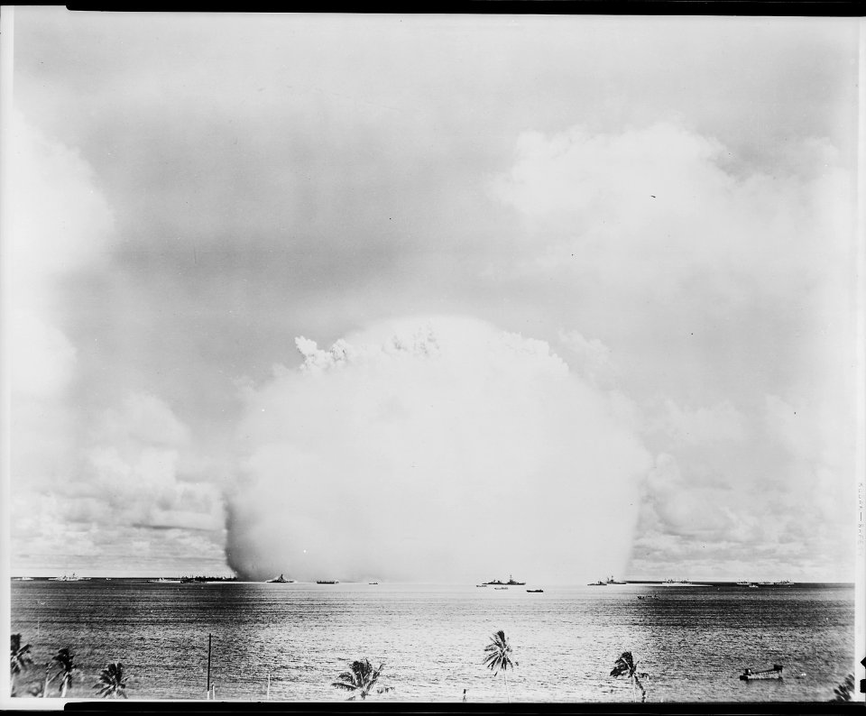 Atomic cloud during Baker Day blast at Bikini. Atomic cloud shrouds target fleet. Sweeping out in all directions... - NARA - 520715