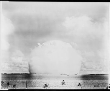 Atomic cloud during Baker Day blast at Bikini. Atomic cloud shrouds target fleet. Sweeping out in all directions... - NARA - 520715