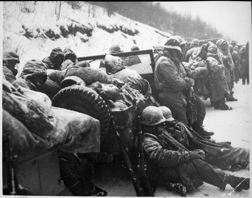 Astonished Marines of the 5th and 7th Regiments, who hurled back a surprise onslaught by three Chinese communist... - NARA - 532409