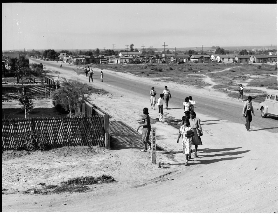 Bakersfield, California. Miscellaneous. These Negro youth are returning to their squalid homes in the Sunset district... - NARA - 532250