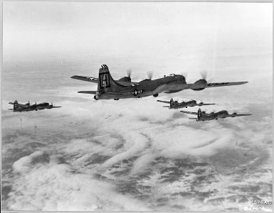 B-29s of the U.S. Far East Air Forces speed to dump tons of bombs on the Chinese Red's military targets. In... - NARA - 542242 photo