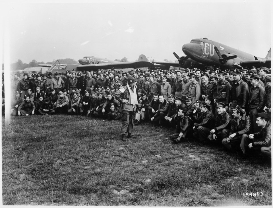 Brigadier General Anthony C. McAuliffe, artillery commander of the 101st Airborne Division, gives his various glider... - NARA - 531246