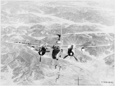 Bombs Away-This Fifth Air Force B-26 Invader of the 452nd Bombardment Wing drops its load of general purpose bombs on... - NARA - 542226