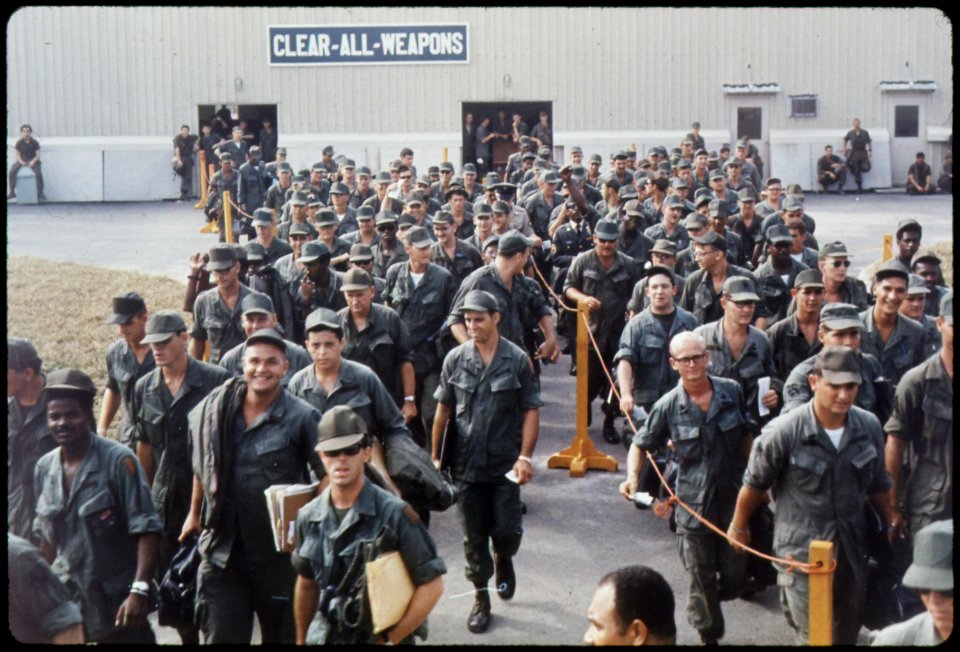 Bien Hoa, Vietnam. Personnel destined to return to the U.S., wait at the Bien Hoa Air Terminal for a National... - NARA - 530628