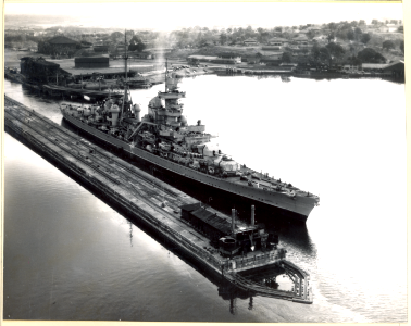 Captured German cruiser PRINZ EUGEN transiting the Gatun Locks. K-20, Alt. 400'. - NARA - 80-G-365071