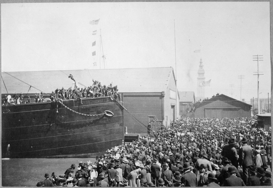 Camp Merritt, California Transport Indiana receiving troops and freight at Pacific Mail Docks on eve of departure. Crowd - NARA - 530697