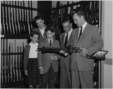 Carl Mydans, who is on the photographic staff of Life magazine, visited FBI Headquarters with his family and was... - NARA - 518188