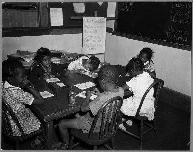 Charles County, Maryland. First-graders at the Waldorf Negro elementary school color and draw while . . . - NARA - 521561