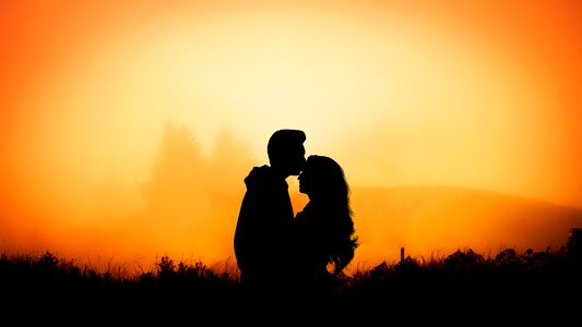 Silhouette sun romance photo