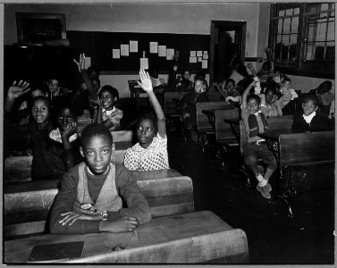 Charles County, Maryland. Upper-grade pupils in the Waldorf Negro elementary school are ready to ans . . . - NARA - 521562 photo