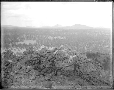 Cinder cones near San Francisco Mountain, Coconino County, Arizona. Close-up of a man standing in - NARA - 517779