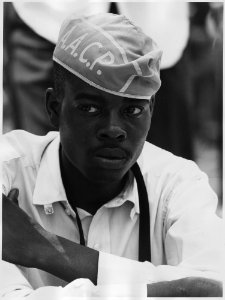 Civil Rights March on Washington, D.C. (A man wearing a National Association for the Advancement of Colored People hat.) - NARA - 542035
