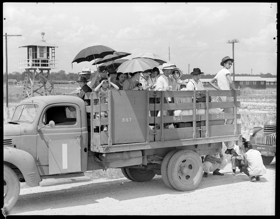 Closing of the Jerome Relocation Center, Denson, Arkansas. Here we go agian A typical truck loa . . . - NARA - 539627